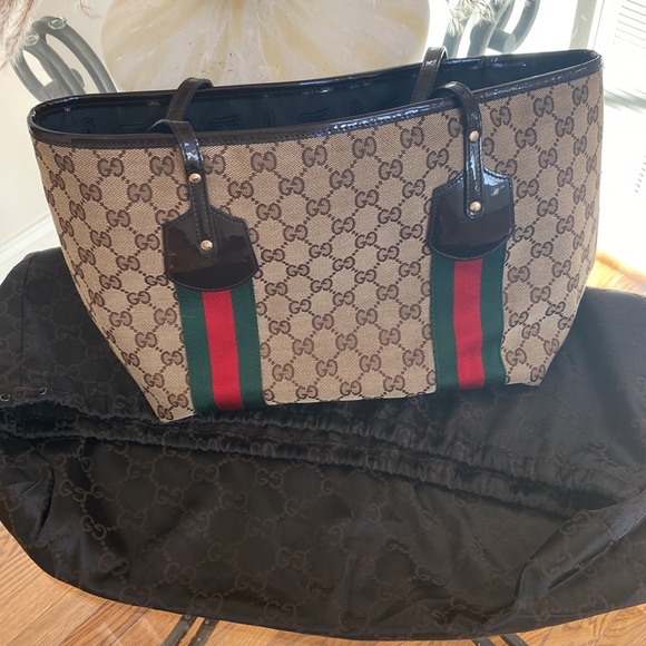 Authentic Gucci brown monogram canvas tote!With three charms.Near perfect! - Picture 12 of 14